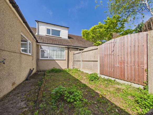 Private, well-established garden with lawn, patio seating and space to grow
