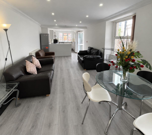Contemporary Living Space with Grey Oak Flooring.p