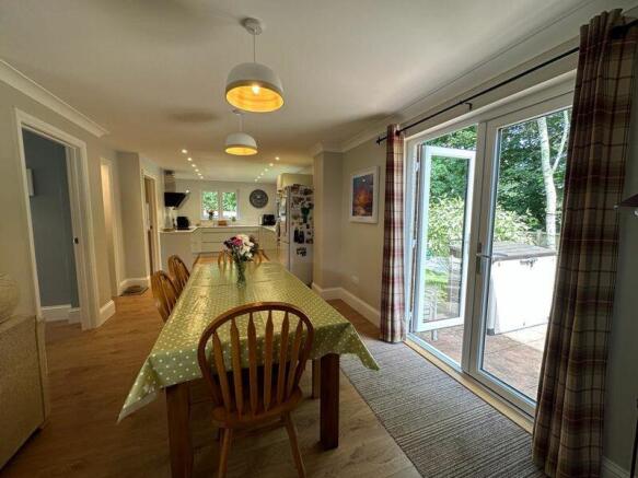 Dining area with doors to garden