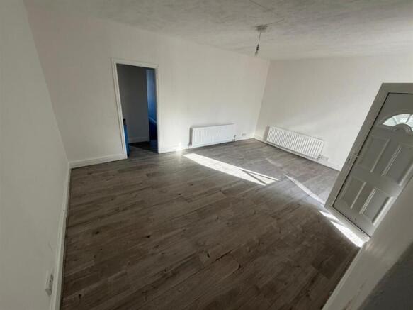 Spacious bright lounge with modern flooring...