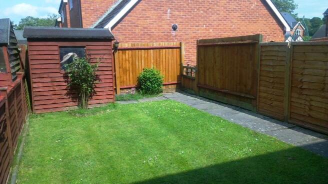 Rear Garden with store shed