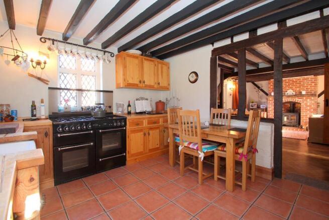 Kitchen showing open studwork to Lounge
