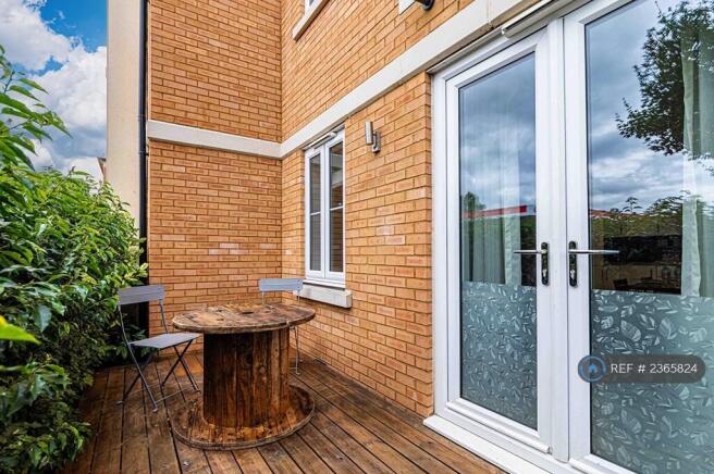 Charming Balcony With Seating And Privacy