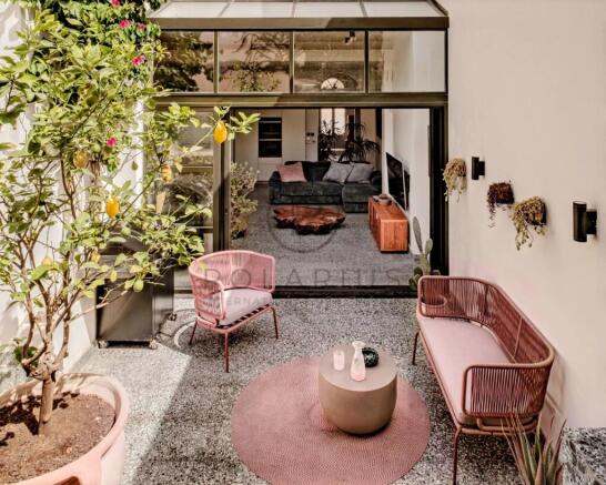 Bright indoor-outdoor living space featuring styli