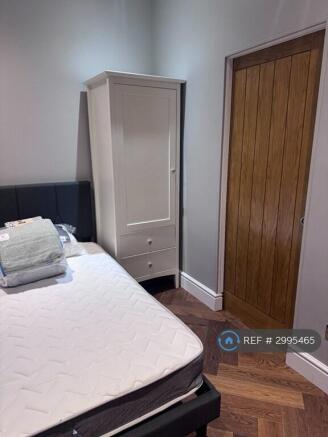 View Within Bedroom With En-Suite Bathroom Door