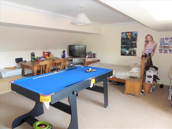 BEDROOM 5 (ABOVE GARAGE)