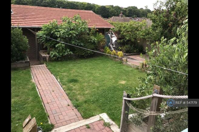 Back Garden And Double Garage