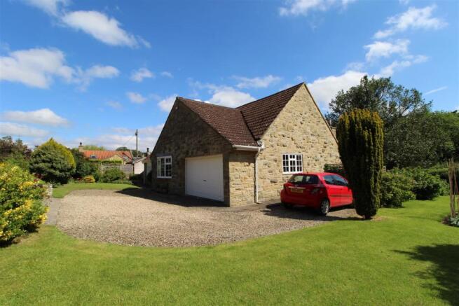 DOUBLE GARAGE & DRIVEWAY