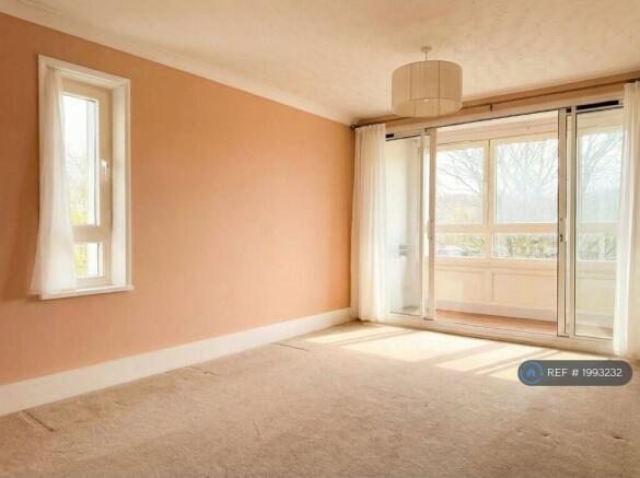 Living Room With Sunroom
