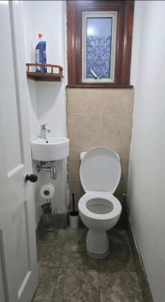 Convenient private WC with window and sink...