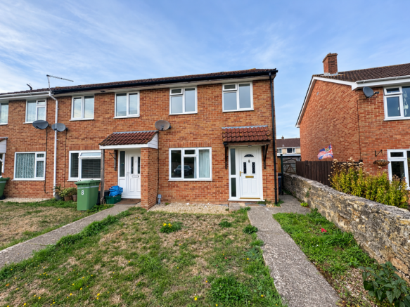 Sunlit Brick Terraced Houses and Front Garden (1)