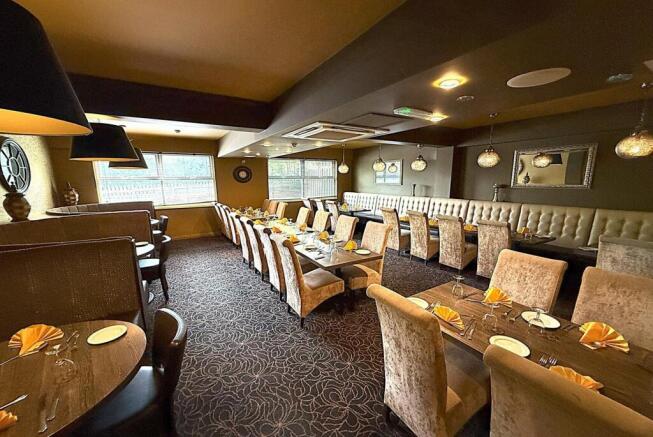 Spacious, well-upholstered communal dining loun...