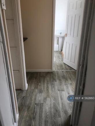 Utility Area With Downstairs Bathroom 
