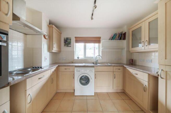 Kitchen with built-in appliances