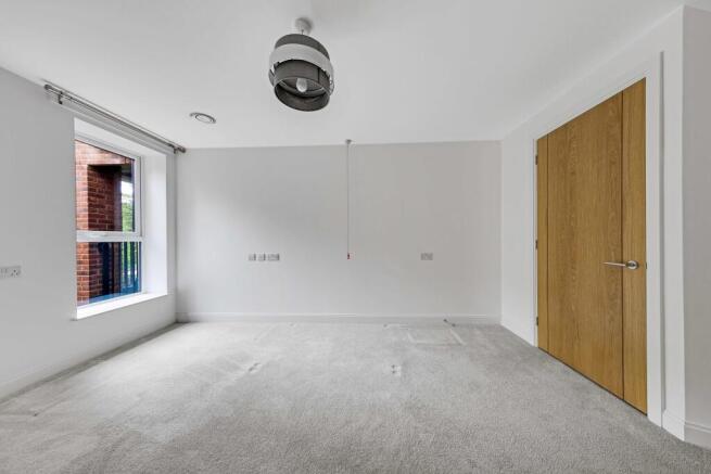 a room with a door and a window