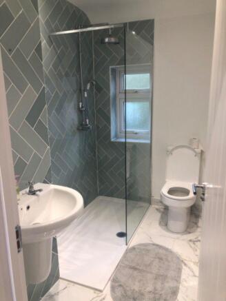 On the right of the kitchen is the washroom