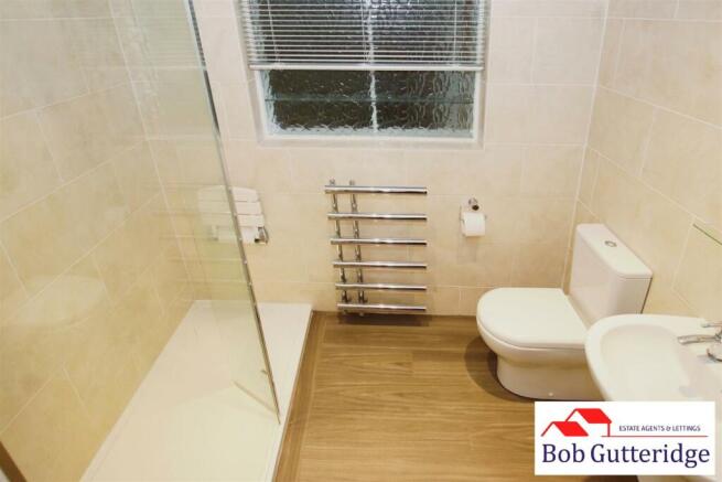 FULLY TILED SHOWER ROOM