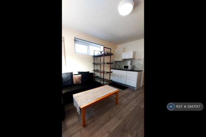 The Kitchen Area In The Flat