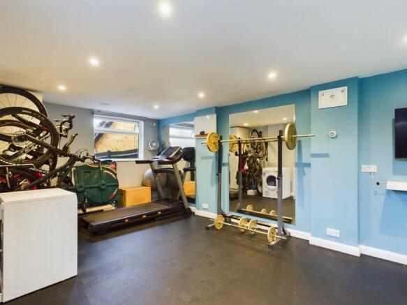 GYM/HOME OFFICE. FORMERLY A GARAGE