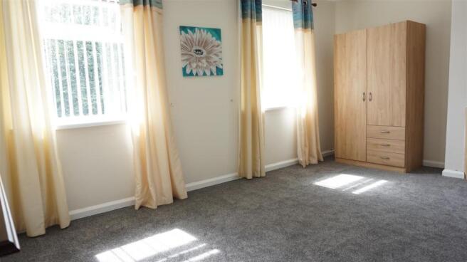 BEDROOM ONE (FRONT)