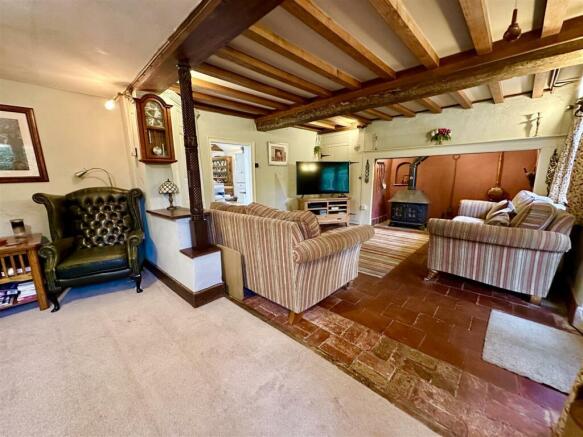 lounge with inglenook fireplace.JPEG