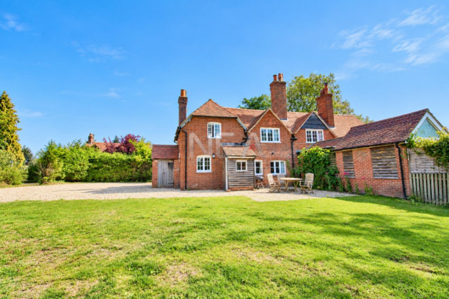 Rear of property with driveway