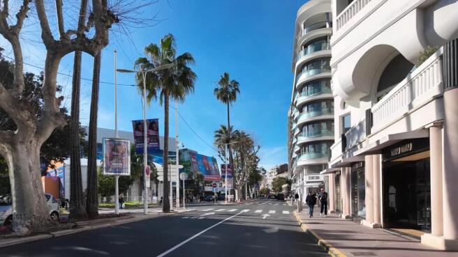 French Riviera. Boulevard de la Croisette in Cannes, Provence-Alpes-Cote d'Azur, France 25 February 2025. architecture beach clubs building cannes cannes beach cannes film festival city cityscape coas