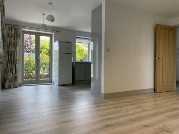 Looking at kitchen form living room.jpg