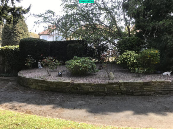 View of communal garden from lounge and bedroom