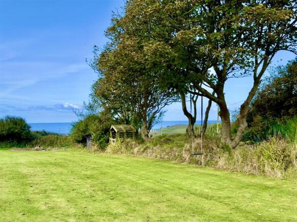 FRONT LAWN WITH SEA VIEW.jpeg