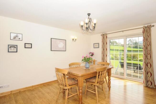 Opening off the kitchen with doors to the terrace