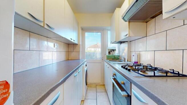 Bright modern kitchen with extensive counter sp...