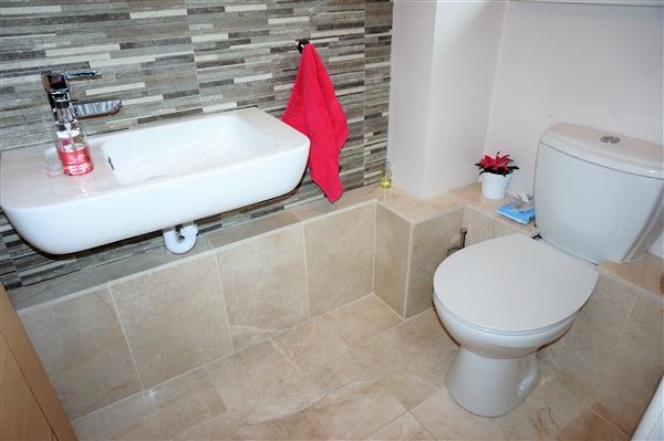 CLOAKROOM AND TOILET