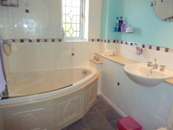 Part tiled Bathroom