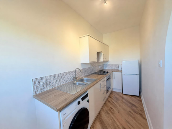 Bright Minimalist Galley Kitchen.png