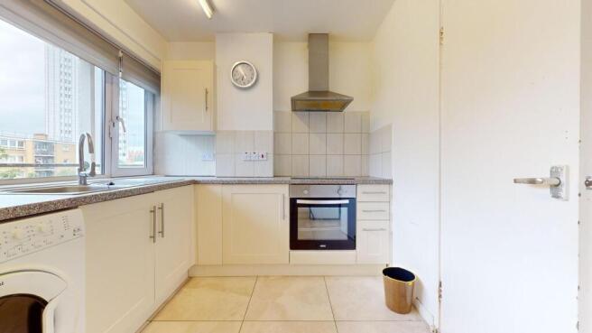 Bright kitchen with modern appliances and views...
