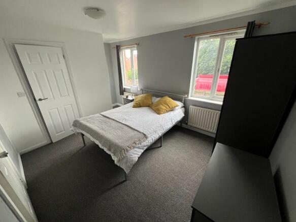 Bright, neatly presented double bedroom with a ...