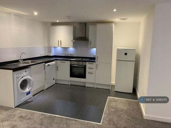 Kitchen With All White Goods