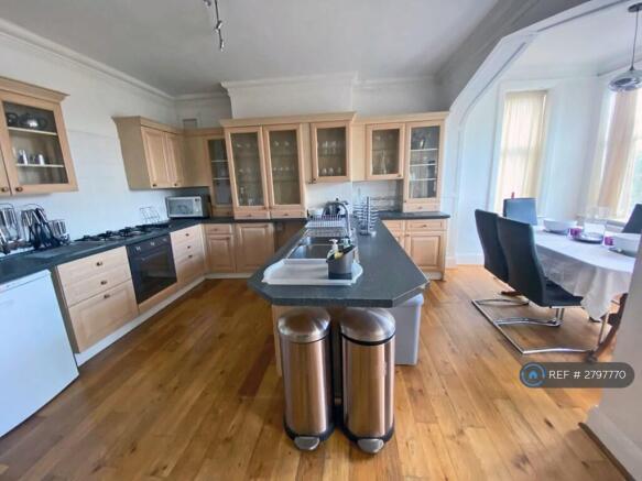 Kitchen Fully Fitted And Equipped With Dining Area