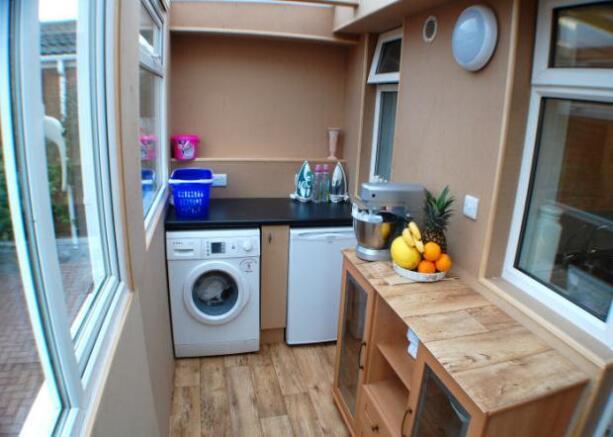 REAR PORCH / UTILITY AREA