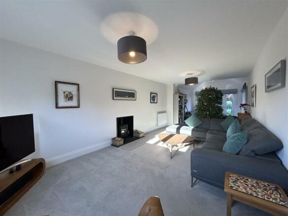FRONT LOUNGE FRONT TO BACK.jpg