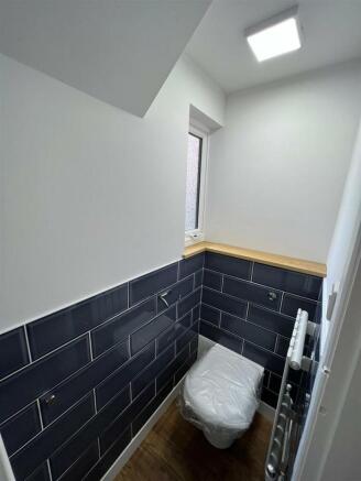 REFITTED DOWNSTAIRS WC