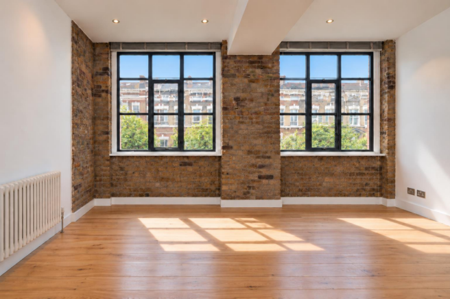 Sunlit Industrial Loft Interior (1).png