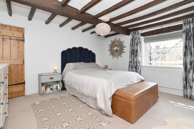 Bedroom 1 to door and window.jpg