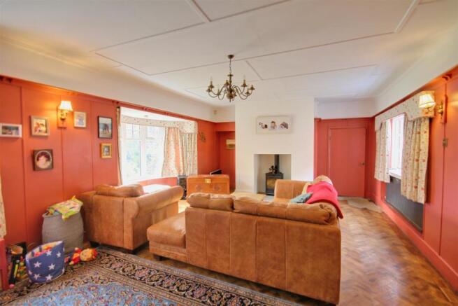 Imagine sat relaxing in front of the log burner.jp