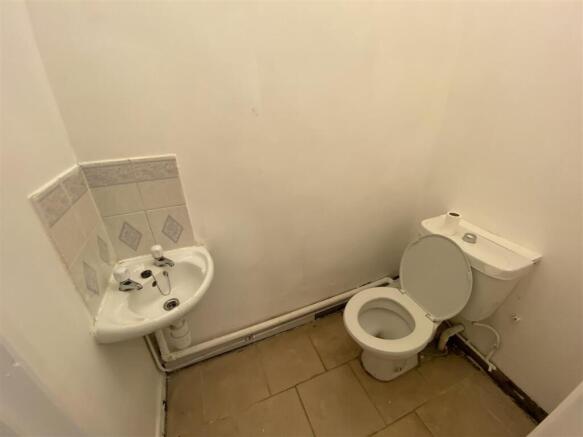 Convenient and tidy guest bathroom suite...