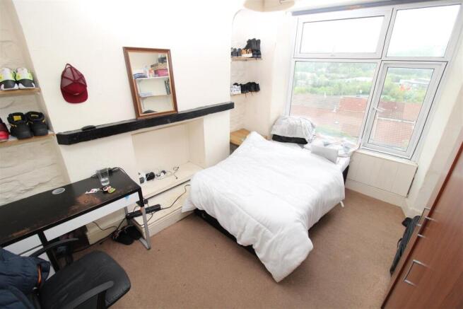 Bright bedroom with double bed and desk space...