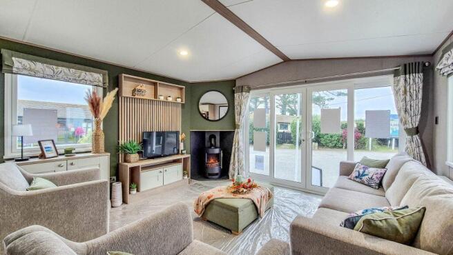 Spacious lounge with feature fireplace