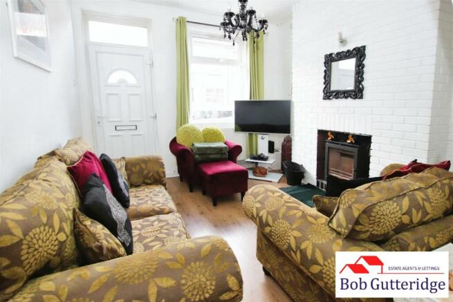 THROUGH LOUNGE/DINING ROOM