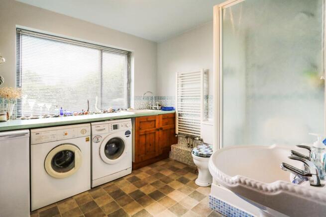 Utility Room/ Shower Room